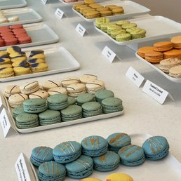 a variety of macarons on display a variety of macarons on display
