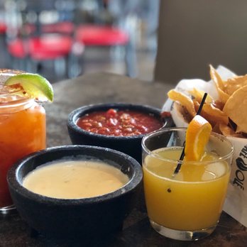 Cafe Olé - Queso and chips with a delicious Mimosa and Bloody Mary! - Mexican Near Me - Memphis, Tennessee Cafe Olé - Queso and chips with a delicious Mimosa and Bloody Mary! - Mexican Near Me - Memphis, Tennessee