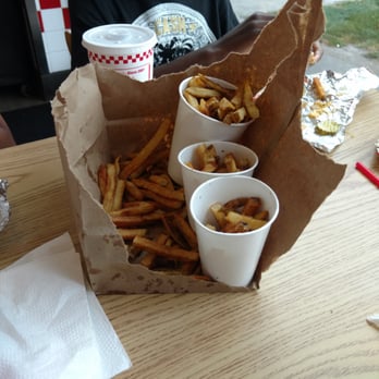 Five Guys - 1 regular and 2 little fries, look at all the fries on the bottom. - Burgers Near Me - Puyallup, Washington