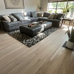 Sanded and stained previous wood flooring.