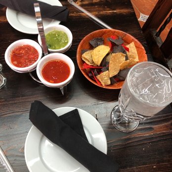 Del Barrio - Red, blue and yellow corn tostada chips with 3 salsas. Nice start. Dark red sauce is hot but not blistering! - Salad Near Me - Pecos, Texas