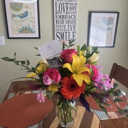 Flowers on Richmond - Beautiful arranged blast of colors that brings joy and smiles on our Anniversary! Great Job & Thanks!
