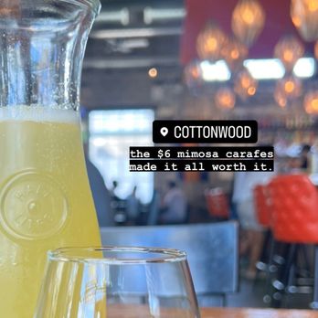 Cottonwood - a pitcher of lemonade next to a glass of lemonade - New American Near Me - Houston, Texas Cottonwood - a pitcher of lemonade next to a glass of lemonade - New American Near Me - Houston, Texas