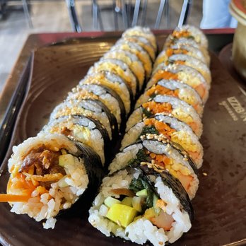 Izzi Korean Kitchen - Spicy pork kimbap (left), traditional kimbap (right) - Korean Near Me - Orlando, Florida