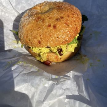 B's Bagels & Butters - Chicken curry salad bagel sandwich with a truffle Parmesan bagel, toasted - Bagels Near Me - Gig Harbor, Washington