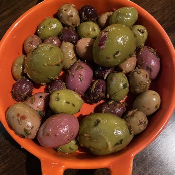 Palo Tapas Bar - Olives with citrus zest, garlic and thyme - Tapas Bars Near Me - Providence, Rhode Island Palo Tapas Bar - Olives with citrus zest, garlic and thyme - Tapas Bars Near Me - Providence, Rhode Island