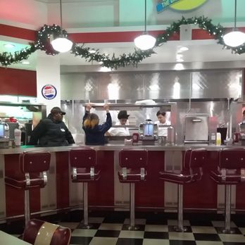Johnny Rockets - This doesn't really show how many were loafing behind the counter since my phone wouldn't pan to show everyone. I had counted 17 people - Burgers Near Me - West Mifflin, Pennsylvania