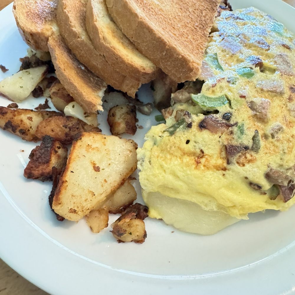 Toasties Cafe - Italian sausage omelette - American Near Me - Pacific Grove, California Toasties Cafe - Italian sausage omelette - American Near Me - Pacific Grove, California