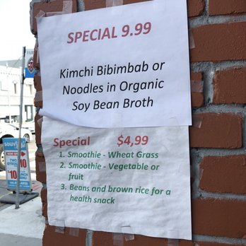 Bio Cafe - a sign on the side of a brick building - Cafes Near Me - Toronto, Ontario