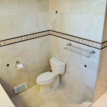 Integral Tile - a bathroom with a toilet and shower - Flooring Near Me Integral Tile - a bathroom with a toilet and shower - Flooring Near Me