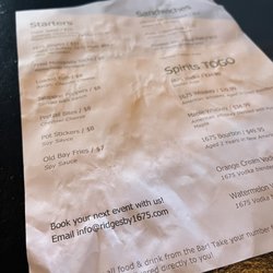 1675 At The Ridges - Perhaps a chalkboard menu or maybe a scan your phone style would be better options. This was our well used and worn "menu"