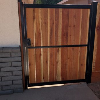YG Fencing - New gate mounted on a metal fence post. - Fences & Gates Near Me YG Fencing - New gate mounted on a metal fence post. - Fences & Gates Near Me
