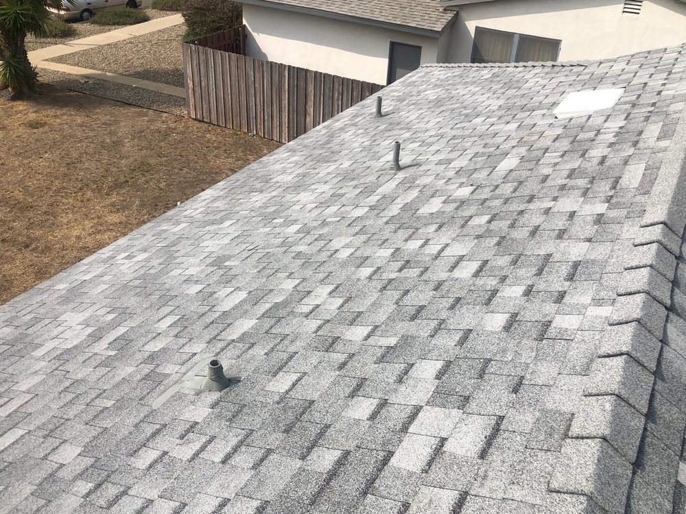 Slide of All American Construction and Roofing