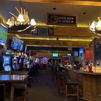 Bullwinkles - Partial view of indoor dining, bar & slot machines - New American Near Me - West Yellowstone, Montana