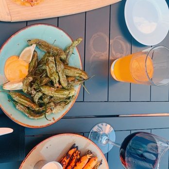 Knotty Deck Kitchen & Bar - Pork tostadas, pepito's, perfect grilled carrots, pineapple wheat beer, Cabernet. - Bars Near Me - Austin, Texas Knotty Deck Kitchen & Bar - Pork tostadas, pepito's, perfect grilled carrots, pineapple wheat beer, Cabernet. - Bars Near Me - Austin, Texas