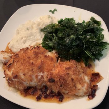 Islands Fish Grill - Onion crusted baked grouper, deep fried spinach & jalapeño cheese grits - Seafood Near Me - Indialantic, Florida
