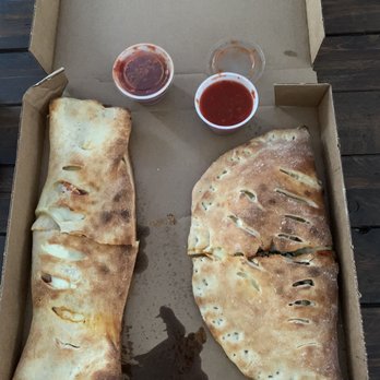 Brooklyn Express Pizza & Pasta - Left is pizza roll, right is calzone. - Pizza Near Me - Irmo, South Carolina Brooklyn Express Pizza & Pasta - Left is pizza roll, right is calzone. - Pizza Near Me - Irmo, South Carolina