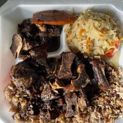 Kool Runnings Jamaican Cuisine - Oxtail with rice, beans and cabbage