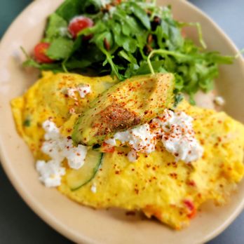 Snooze, an A.M. Eatery - an omelet and a salad - Breakfast & Brunch Near Me - Austin, Texas Snooze, an A.M. Eatery - an omelet and a salad - Breakfast & Brunch Near Me - Austin, Texas