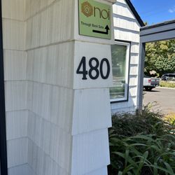 Noi Massage Comfort and Spa - Go around side of building to reach gated entrance