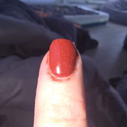 Queen Nail - Index nail with paint all over the skin surrounding the nail. Right hand - up close.