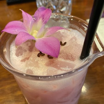 Qi Austin - Wild orchid cocktail.  Delish and with a little kick...and the orchid was edible! - Dim Sum Near Me - Austin, Texas