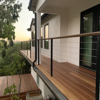 Dr Deck - a view of a house from a balcony - Decks & Railing Near Me - Los Angeles, California Dr Deck - a view of a house from a balcony - Decks & Railing Near Me - Los Angeles, California