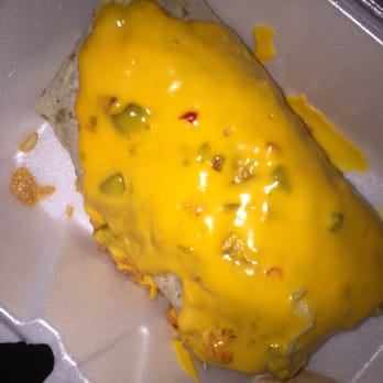 La Mex - My boyfriends wet burrito he took about 4 bites lol but I didn't even know Mexican places had a yellow cheese - Mexican Near Me - Pontiac, Illinois La Mex - My boyfriends wet burrito he took about 4 bites lol but I didn't even know Mexican places had a yellow cheese - Mexican Near Me - Pontiac, Illinois