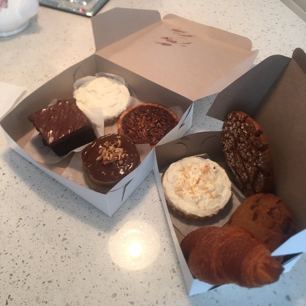 Banana and pecan tartlets, chocolate and apple walnut cakes, ginger crackle and chocolate chip cookies, coconut tartlet, and a croissant Banana and pecan tartlets, chocolate and apple walnut cakes, ginger crackle and chocolate chip cookies, coconut tartlet, and a croissant