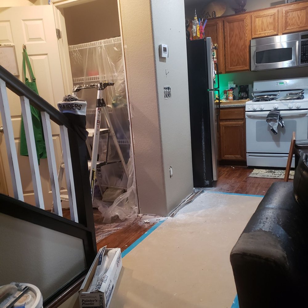 Pro Restoration - a living room and kitchen being remodeled - General Contractors Near Me - Las Vegas, Nevada Pro Restoration - a living room and kitchen being remodeled - General Contractors Near Me - Las Vegas, Nevada