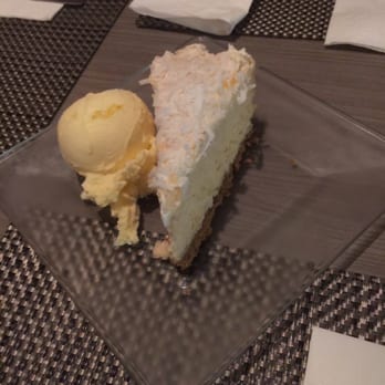 La Espadaña - Pineapple cheese cake with coconut shavings and vanilla ice cream - Mexican Near Me - Tijuana, BCN