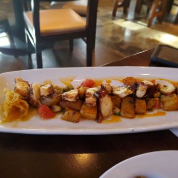 Ember Woodfire Grill - Plancha charred Spanish octopus - New American Near Me - Livonia, New York