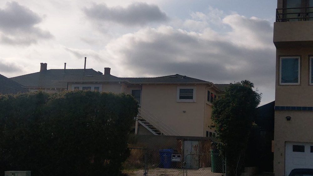 Slide of American Roofing Service