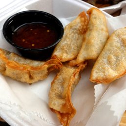 Pork-Stuffed Potstickers w/ sweet chili sauce