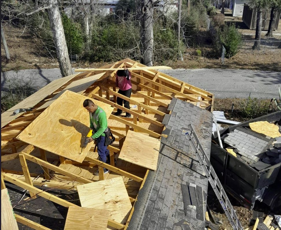 Slide of Heritage Roofing