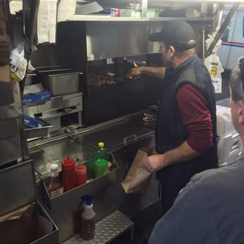 Souvlaki Master - a man preparing food in a commercial kitchen - Street Vendors Near Me - Astoria, New York Souvlaki Master - a man preparing food in a commercial kitchen - Street Vendors Near Me - Astoria, New York