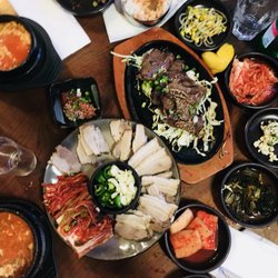 Pyeong Chang Tofu House - Dinner spread: (Middle)Steamed Pork + kimchi, seafood sundobu + 2 complimentary small sundobu + beef