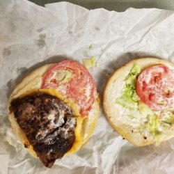 Out To Eat - My husband and I ordered burgers tonight. When we got the food home we each got 1/2 of a patty on a huge bun with toppings.