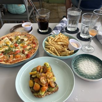 Mala Ocean Tavern - Margarita flatbread, fries with garlic aioli, avocado toast, and POG mimosa - Seafood Near Me - Lahaina, Hawaii Mala Ocean Tavern - Margarita flatbread, fries with garlic aioli, avocado toast, and POG mimosa - Seafood Near Me - Lahaina, Hawaii