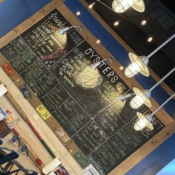Shuckin' Shack Oyster Bar - Menu board full of fresh choices! - Seafood Near Me - Ocala, Florida
