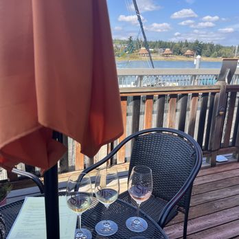 La Conner Sips - Back patio on the water - Wine Bars Near Me - La Conner, Washington La Conner Sips - Back patio on the water - Wine Bars Near Me - La Conner, Washington