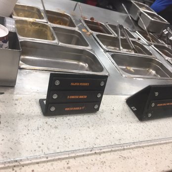 QDOBA Mexican Eats - As you can see most of the containers for add on's were empty. I asked for some grilled veggies...seems like it pissed them off? - Fast Food Near Me - Battle Creek, Michigan QDOBA Mexican Eats - As you can see most of the containers for add on's were empty. I asked for some grilled veggies...seems like it pissed them off? - Fast Food Near Me - Battle Creek, Michigan
