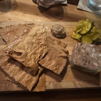 Cochon RESTAURANT - Hog head cheese. Housemaid, crackers. seeded mustard, along with pickled banana, peppers and pickles - Cajun/Creole Near Me - New Orleans, Louisiana Cochon RESTAURANT - Hog head cheese. Housemaid, crackers. seeded mustard, along with pickled banana, peppers and pickles - Cajun/Creole Near Me - New Orleans, Louisiana