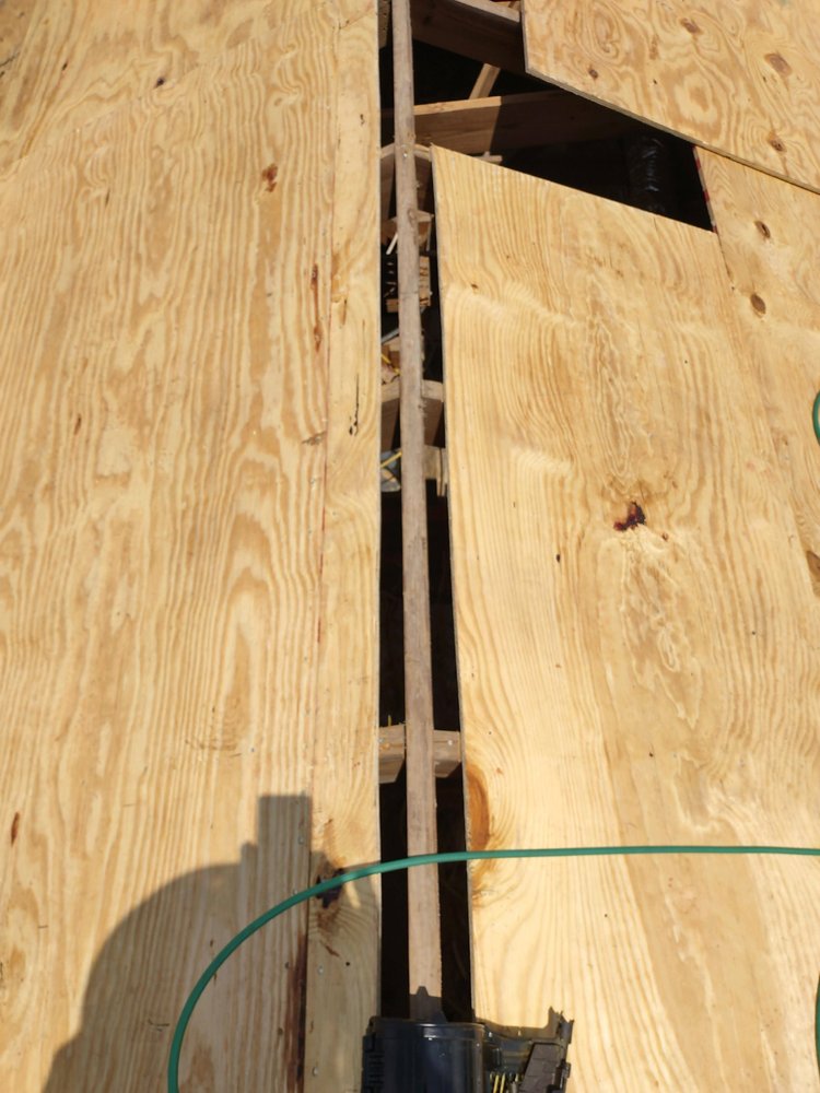 Slide of R Outlaw Roofing