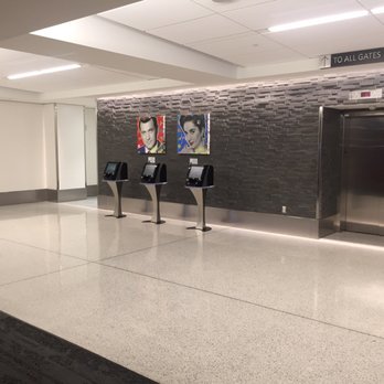 Delta One Lounge - nice art, to the right is the private elevator (completely empty and private) - Airport Lounges Near Me - Los Angeles, California Delta One Lounge - nice art, to the right is the private elevator (completely empty and private) - Airport Lounges Near Me - Los Angeles, California