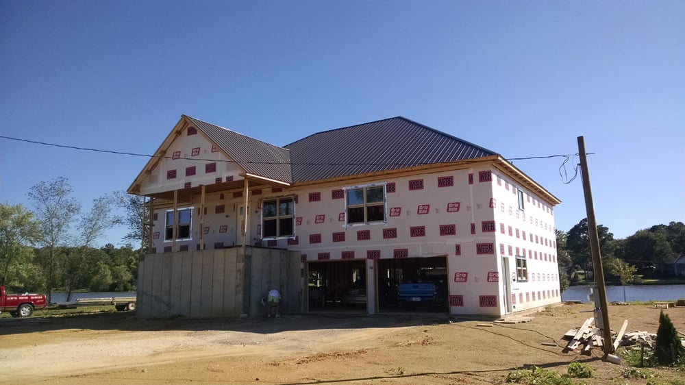 Slide of JC Metal Roofing