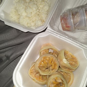 5 Star Korean BBQ - Kimchi dumpling #Steamed. White rice and I don't know what it goes with. Sauces wrapped in plastic but 1 is spilling. - Barbeque Near Me - Madison, Wisconsin