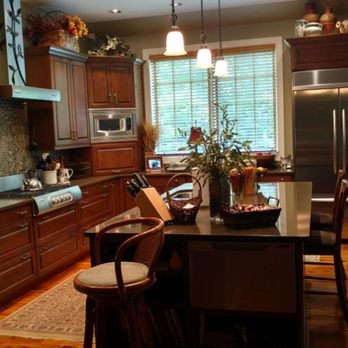 Mathis Roofing - a kitchen with a center island - General Contractors Near Me - Brevard, North Carolina Mathis Roofing - a kitchen with a center island - General Contractors Near Me - Brevard, North Carolina