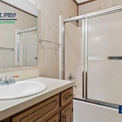 RealPro - That tub had served its purpose, but the space was ready to work better for this homeowner.