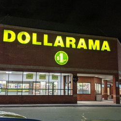 Dollarama - Looking at the store from the parking lot at night. Entrance is on the right